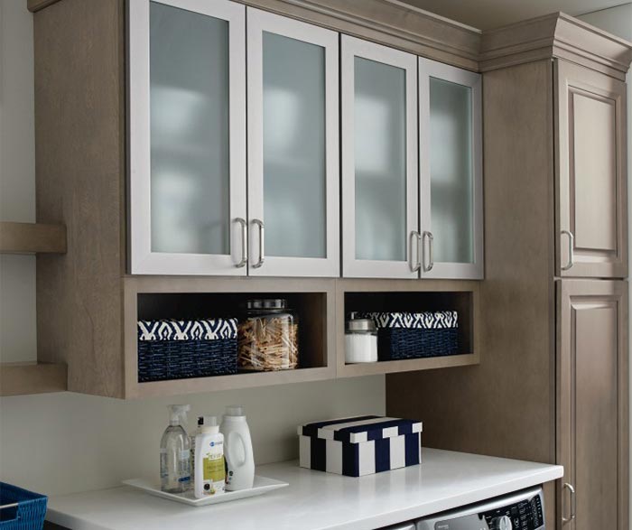 Laundry room storage cabinets with aluminum frame doors and frosted glass