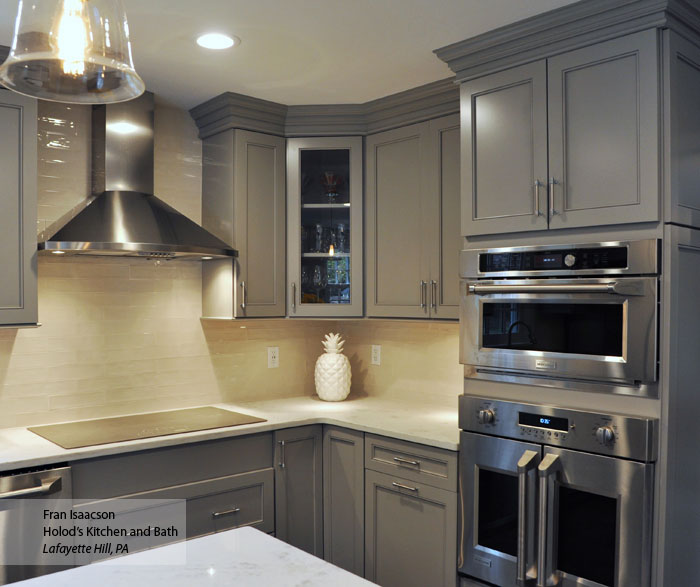 Gray Cabinets and Dark Blue Kitchen Island