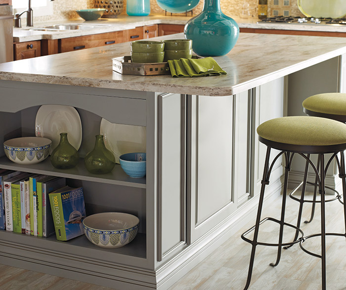 Cherry cabinets with a gray kitchen island